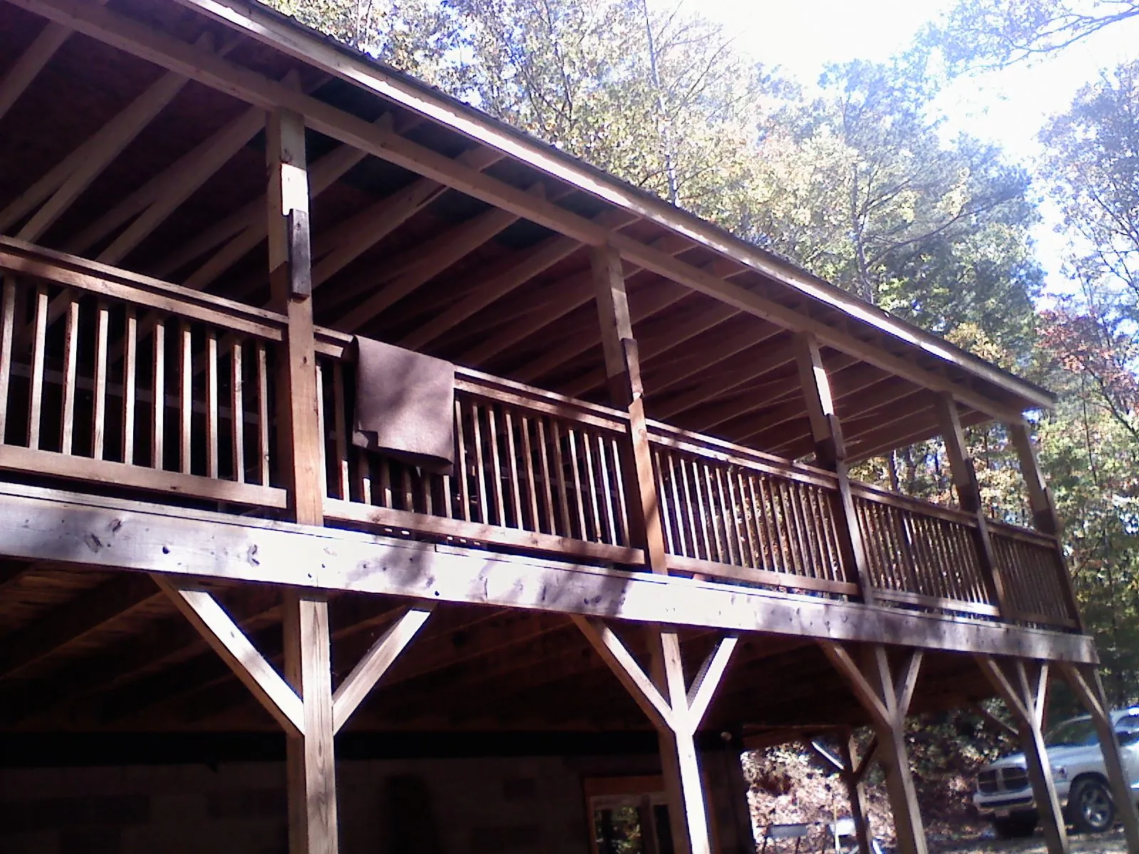 Timber framing under a new elevated porch and deck — Roof Leak Repair in New Richland by Roofing Brothers