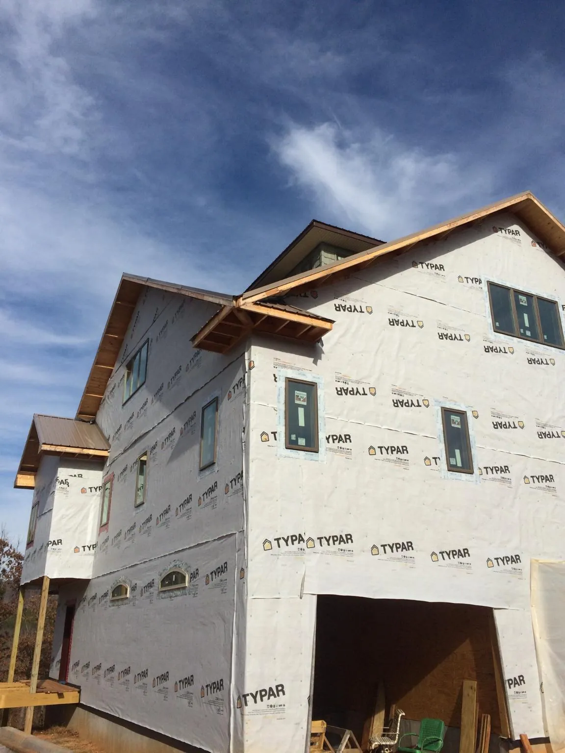 Stick built house wrapped in Typar with new roof framing and dormers in New Richland